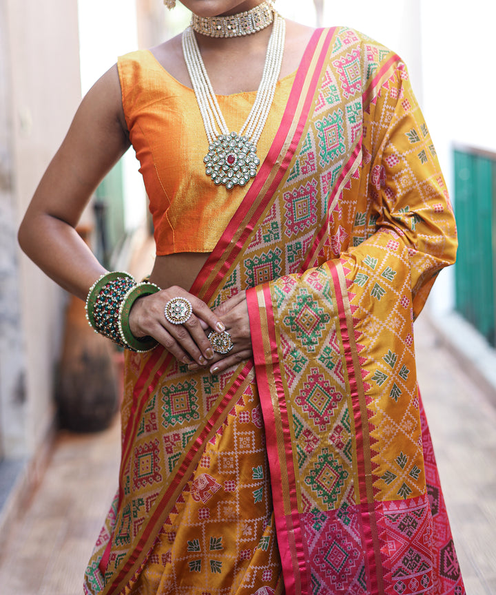 Tangy Orange Patola Weave Silk Saree - PAHRAVA