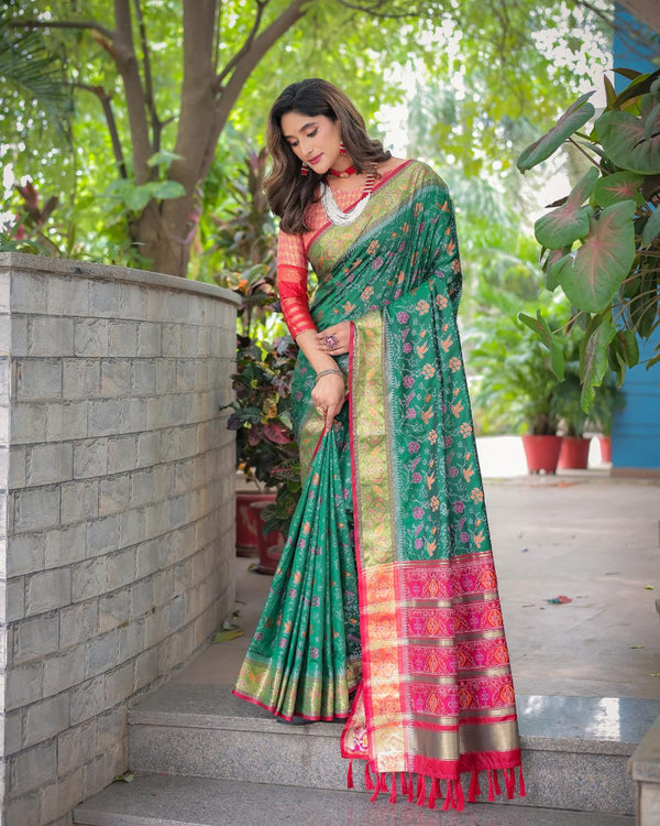 Dark Green Soft Patola Silk Saree with Rich Pallu.