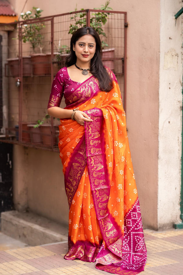 Sunrise Orange soft crape type self-woven smooth fabric with figure woven design border saree.