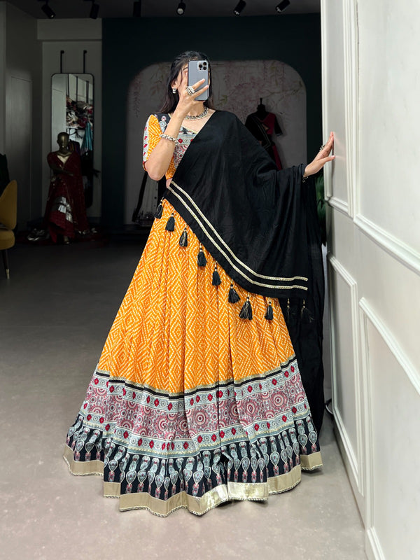 Mustard Yellow Bandhej and Ajrakh prints Lehenga Choli.