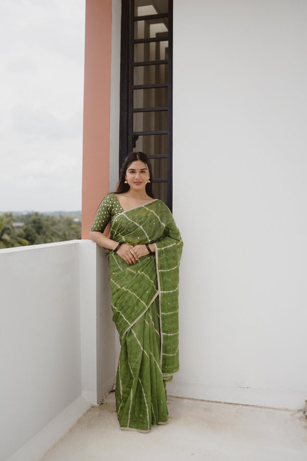 Leaf Green pure Kota saree with tye and dye leheriya.