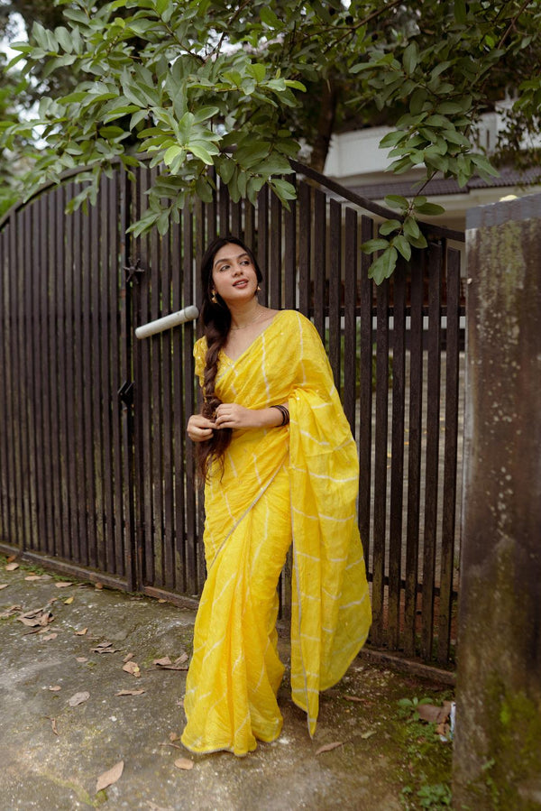 Sunshine Yellow pure Kota saree with tye and dye leheriya.